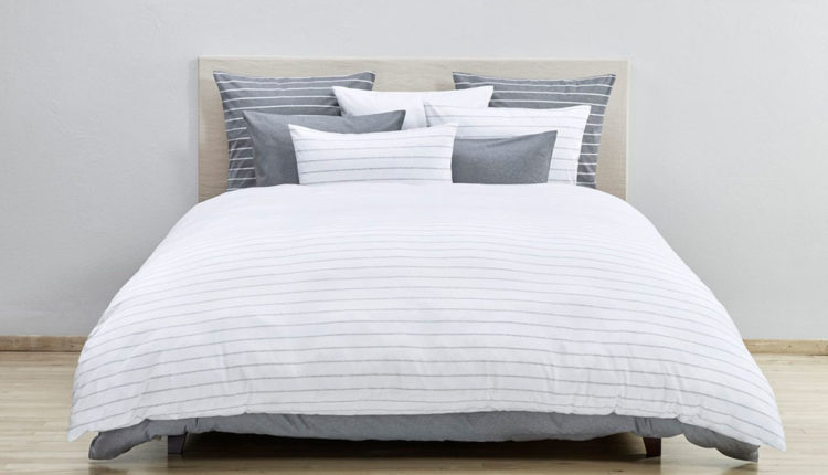 llenceria de llit Christian Fischbacher amb detalls colonials