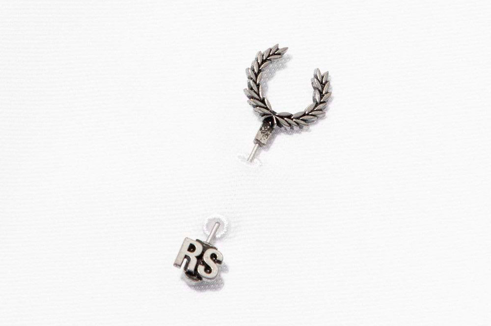 Fermall de corona de llorer insígnia de la marca Fred Perry